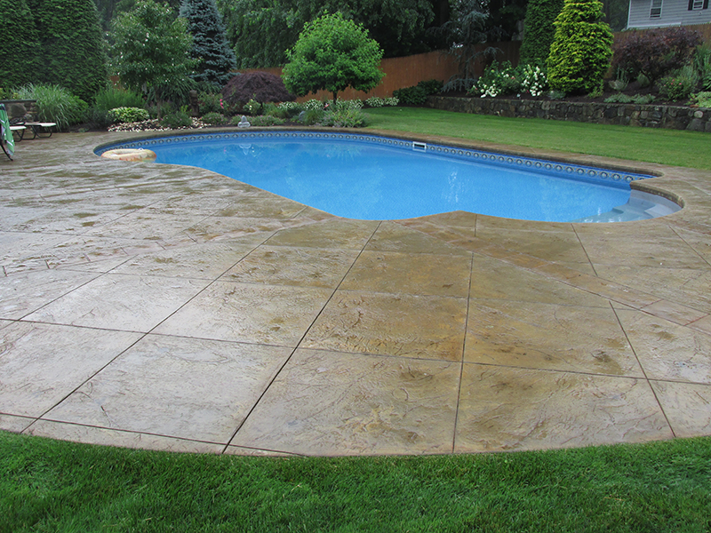 Swimming pool and stamped concrete project example 15